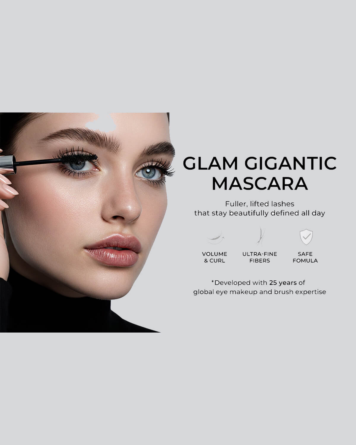 Close-up model demonstration of Glam Gigantic Mascara featuring ultra-fine fibers for volume and curl.