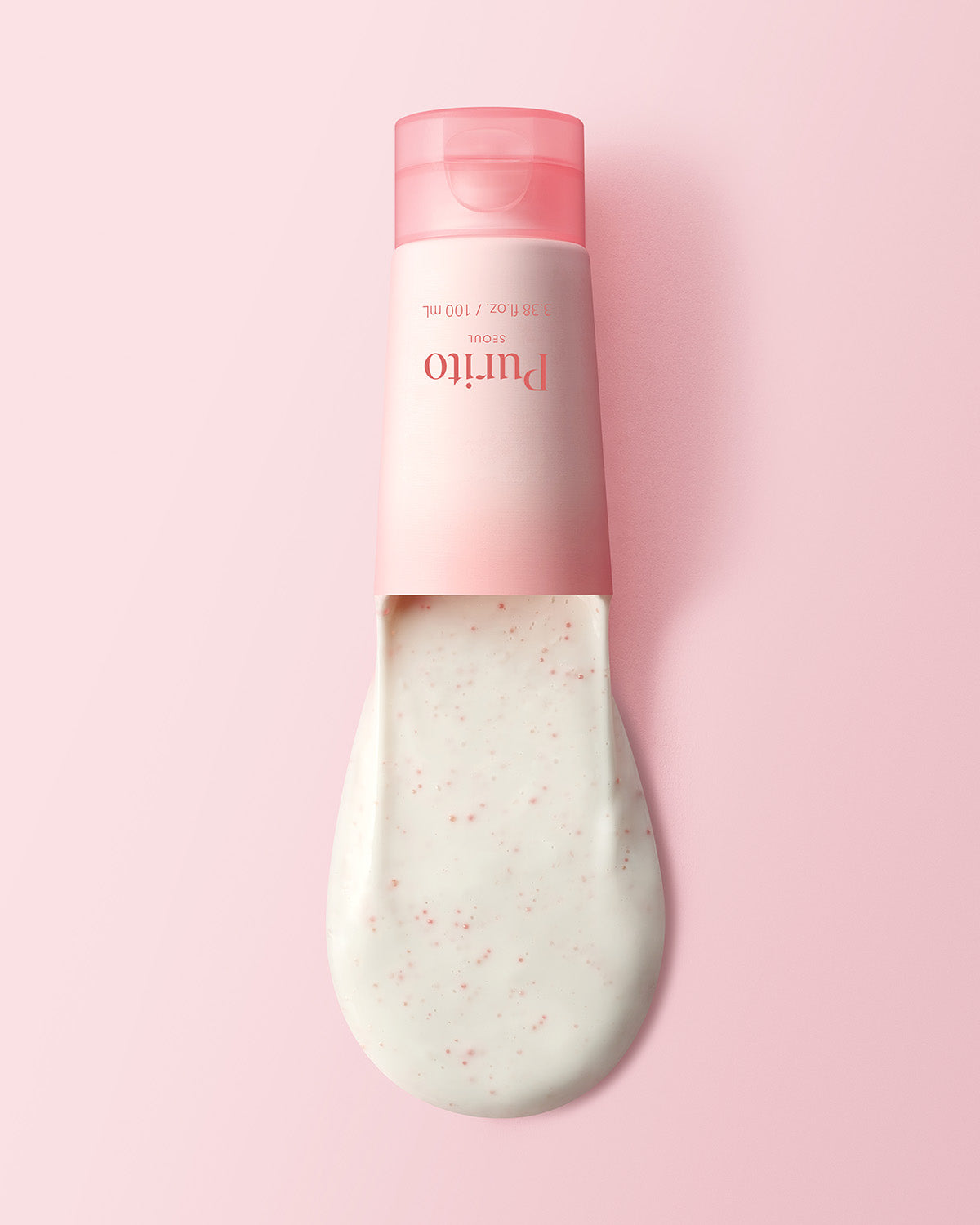 Creamy white texture of Purito Multi PDRN Collagen Real Glow Mask squeezed from its pink tube.