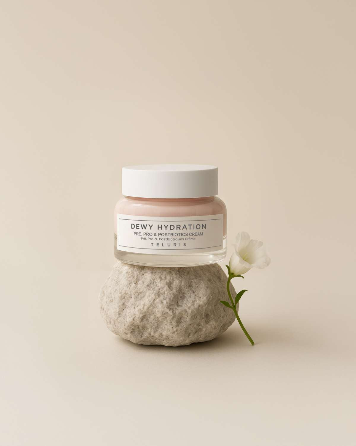 Teluris Dewy Hydration Cream jar styled with fresh blueberries to highlight antioxidant-rich ingredients