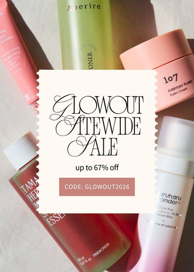 A promotional sale graphic over a flat-lay arrangement of skincare products. The central cream-colored card reads 'GLOWOUT & FATEWIDE SALE up to 67% off' with a code box, surrounded by bottles and jars in pink, green, peach, and white on a light neutral background.