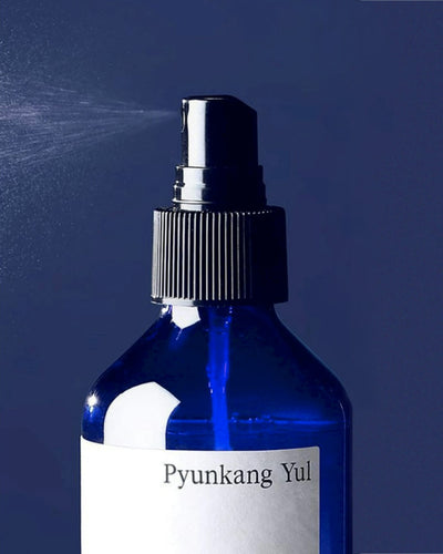 Pyunkang Yul Must Toner against navy background color
