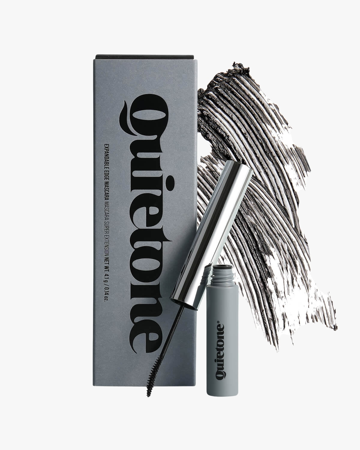 Quietone Expandable Edge Mascara tube, applicator wand, and product box with black mascara texture swatches.