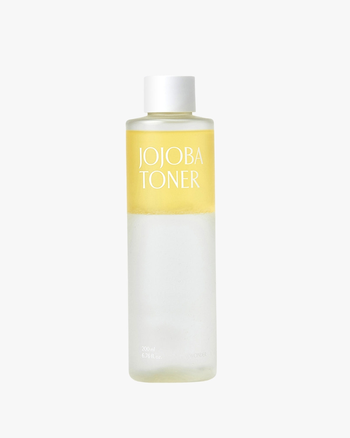 A simple, front-facing product shot of the Pinkwonder Jojoba Toner bottle on a white background, highlighting the two-layer formula (yellow oil and clear toner) and the white cap.