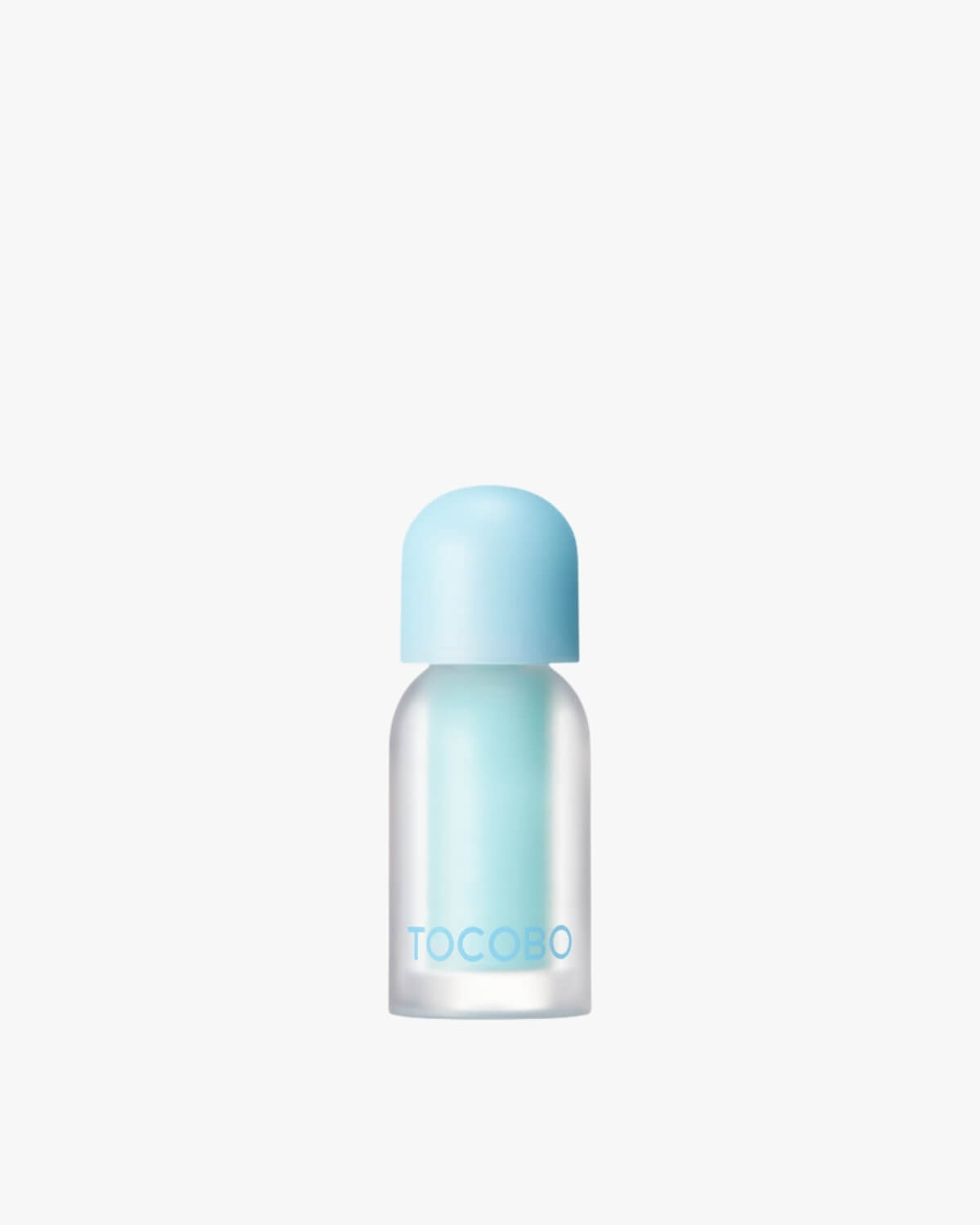 Tocobo Juicy Berry Plumping Lip Oil in shade 00 Frozen Berry, a clear light blue with a spicy sensation.