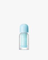 Tocobo Juicy Berry Plumping Lip Oil in shade 00 Frozen Berry, a clear light blue with a spicy sensation.