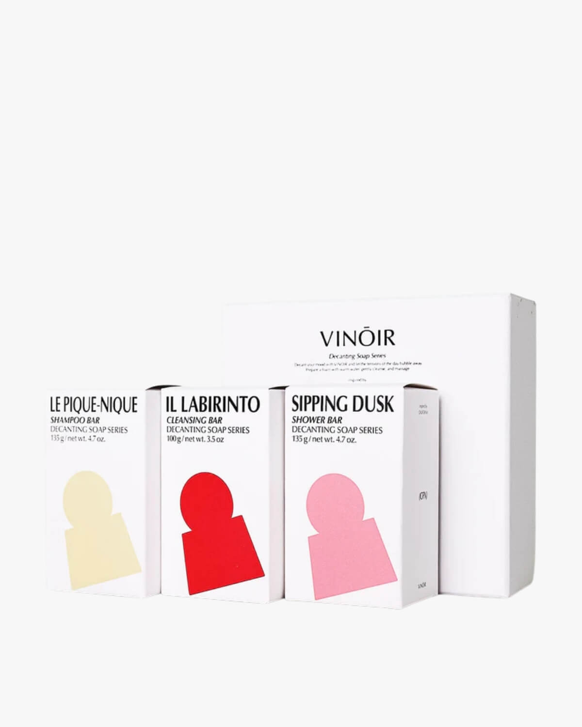 VINŌIR Decanting Soap Series gift set in a white background featuring Le Pique-Nique, Il Labirinto, and Sipping Dusk boxes.
