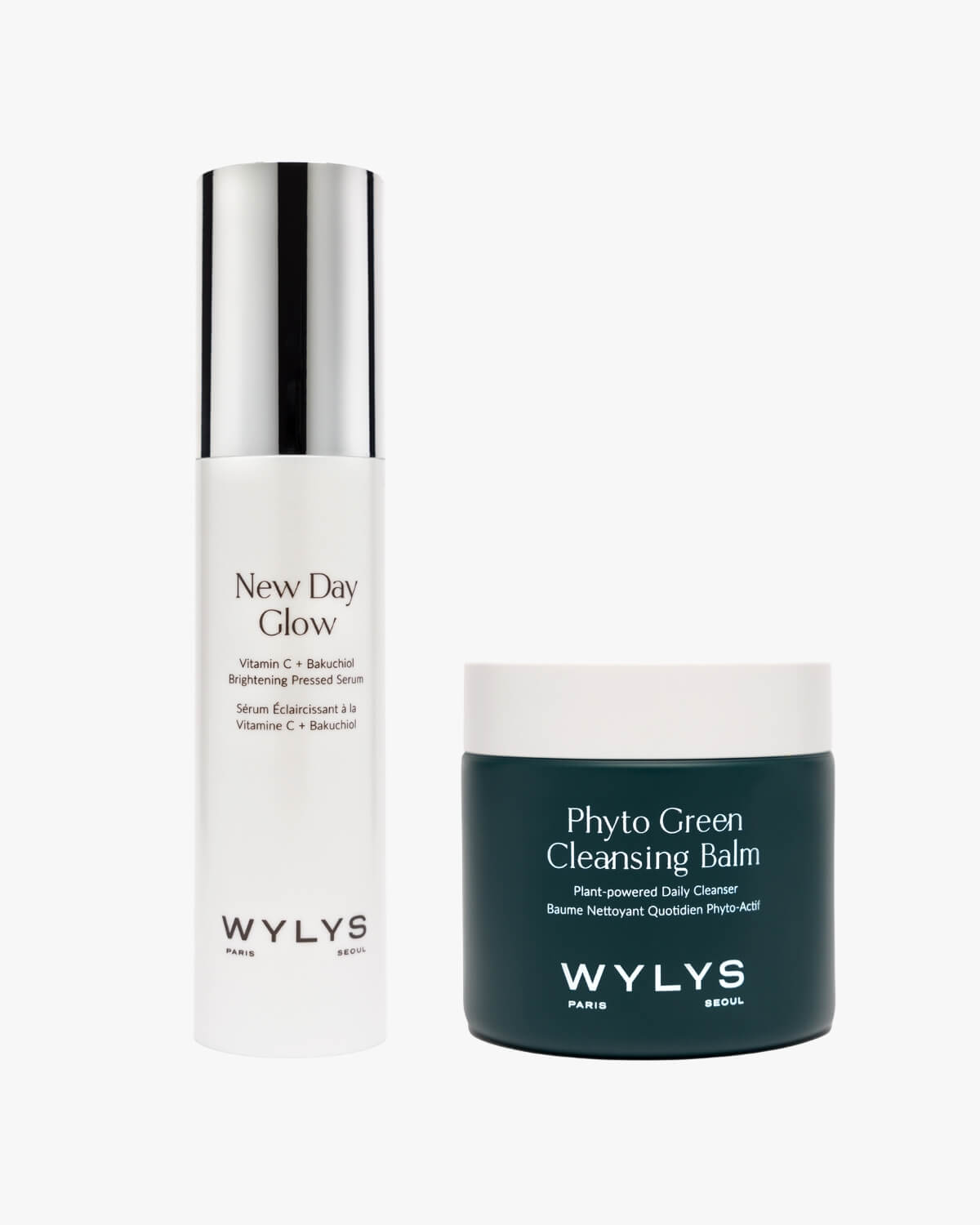 Studio product shot of WYLYS Daily Glow Duo: New Day Glow Serum and Phyto Green Cleansing Balm on white background.