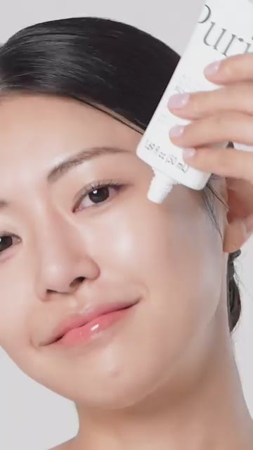 Video demonstrating the application of Purito Sun Day Adventure Sunscreen. Shows the lightweight, cream texture blending easily into the skin with no white cast, leaving a natural, dewy finish.