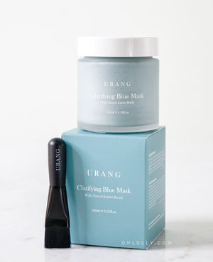 Jar and box of Urang Clarifying Blue Mask, a brightening wash-off treatment with Kaolin Clay to clarify and gently exfoliate dull skin.